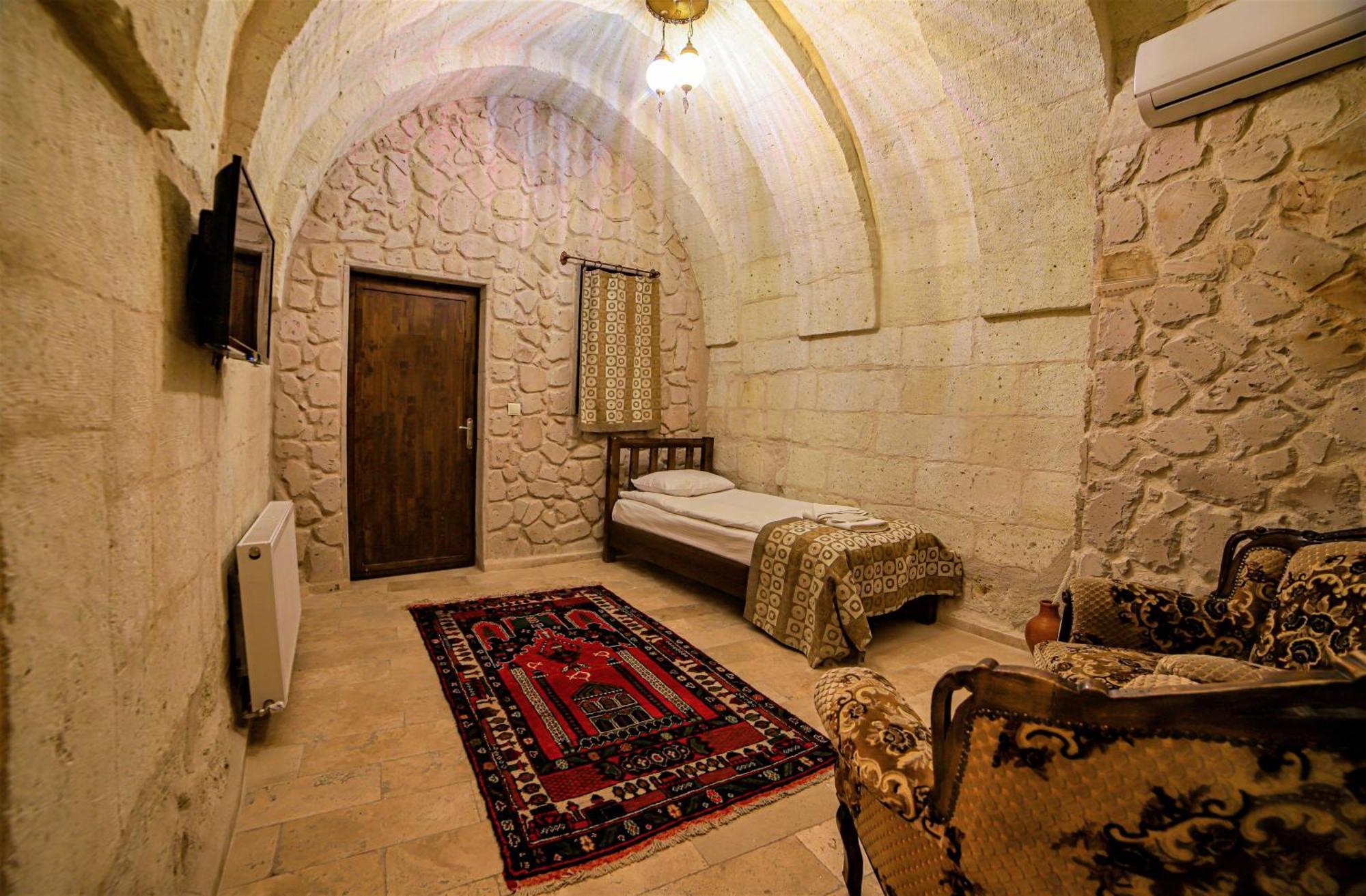 Cappadocia Caves Hotel Goreme Quarto foto